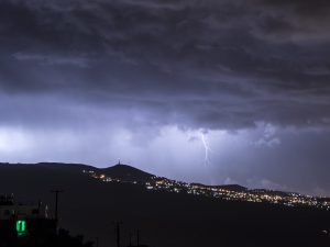Rolling Thunderstorm Above Mountain