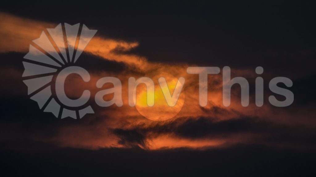 
									Glowing Sun Behind Ominous Clouds